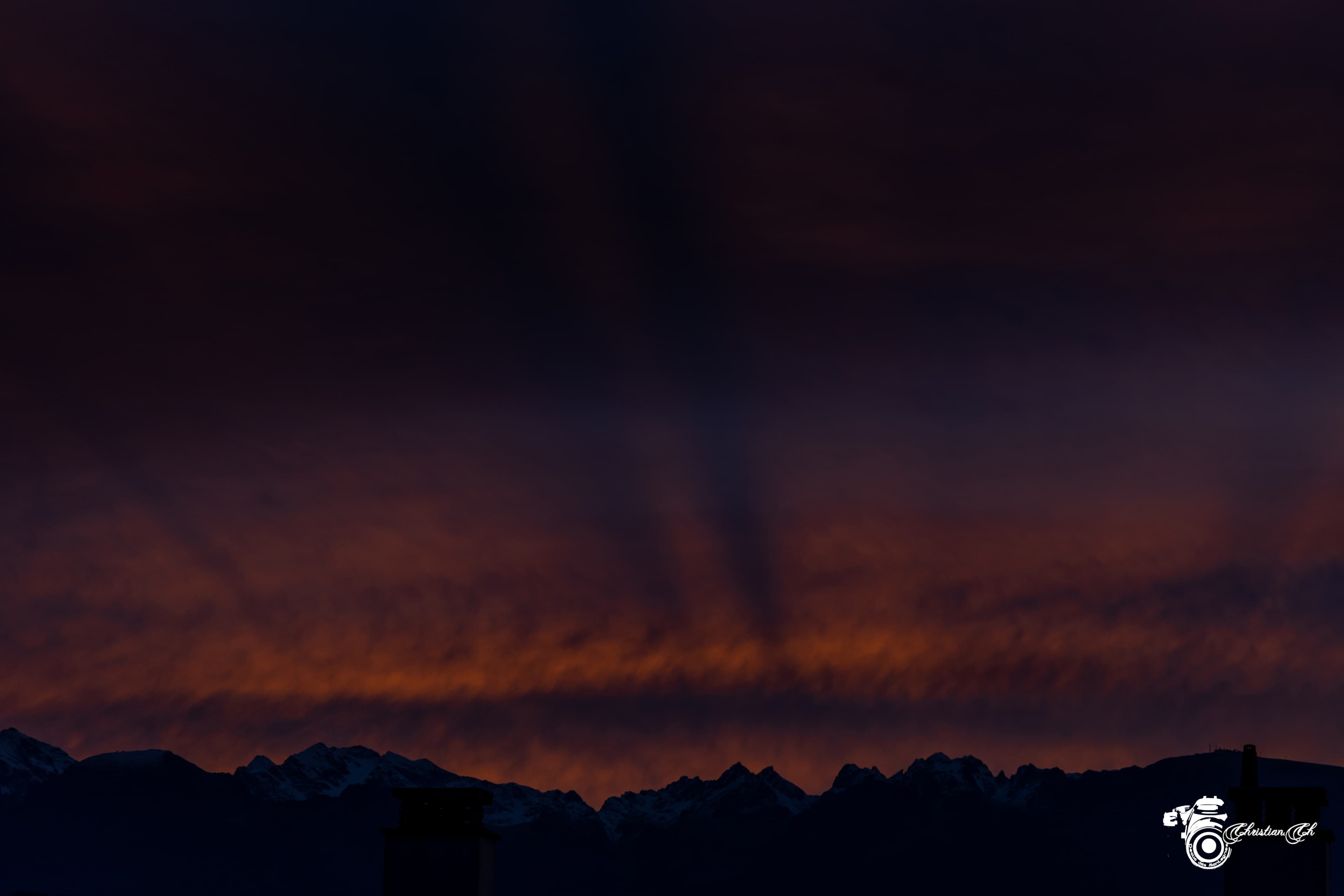 Ciel orangé sur Belledonne
